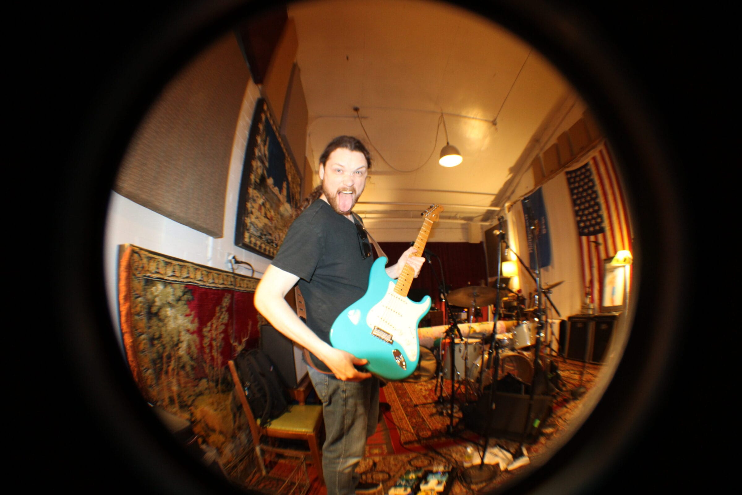 Ryan Eick of Hang Ten with a guitar